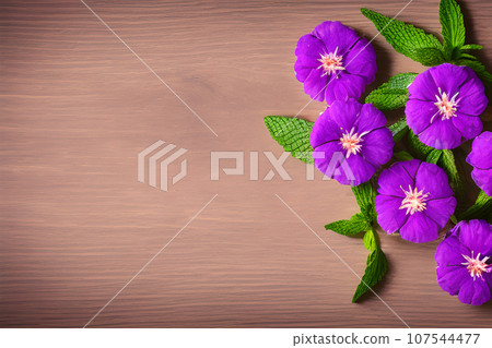 pink flower blossoms on wooden background 107544477