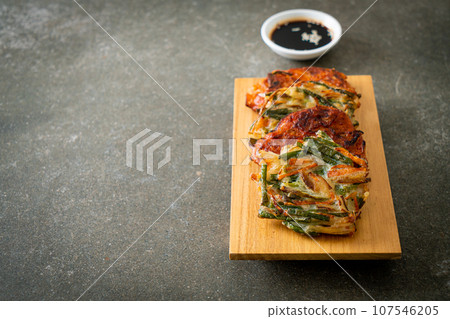 Pajeon or Korean pancake and Korean Kimchi pancake or Kimchijeon on white background 107546205