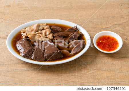 stewed duck offal in brown soup stewed duck offal in brown soup 107546291