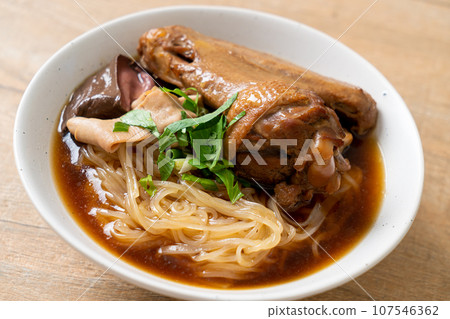 Braised duck noodles with brown soup Braised duck noodles with brown soup 107546362