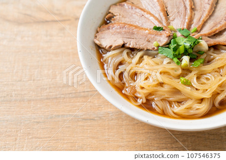 duck noodles with stewed duck soup 107546375