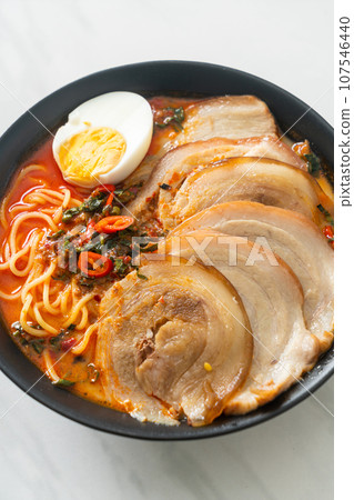 Ramen Noodles Spicy Tomyum Soup with Roast Pork 107546440