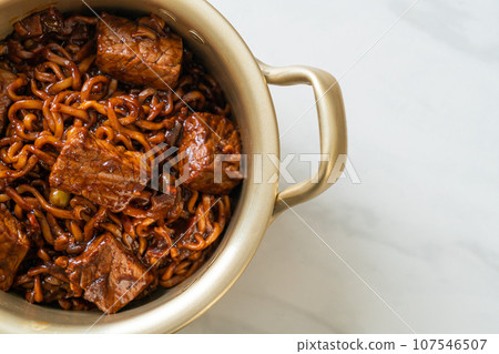 Jjapaguri or Chapaguri, Korean Black Beans Spicy Noodles with Beef 107546507