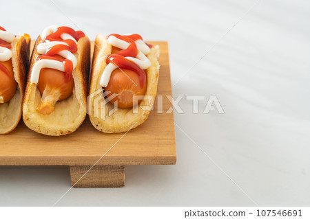 flat pancake roll with sausage 107546691