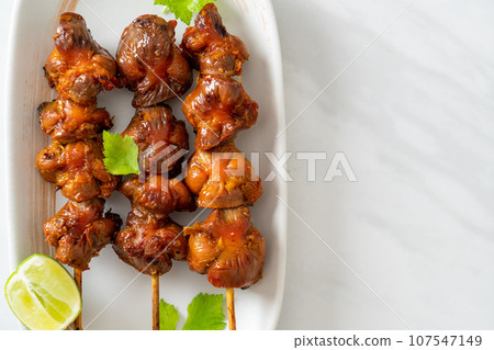 grilled chicken gizzard skewer with herbs and spices grilled chicken gizzard skewer with herbs and spices 107547149