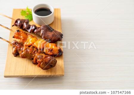 Japanese chicken grill or yakitori serve in izakaya style Japanese chicken grill or yakitori serve in izakaya style 107547166