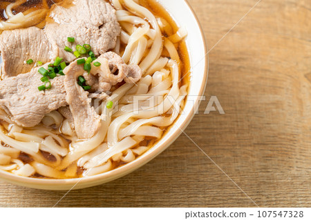 homemade udon noodles with pork in soy or shoyu soup homemade udon noodles with pork in soy or shoyu soup 107547328