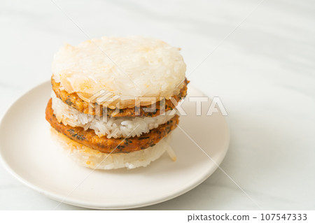 grilled spicy pork and herbs with sticky rice burger grilled spicy pork and herbs with sticky rice burger 107547333