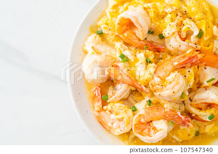 creamy omelet with shrimps or scrambled eggs and shrimps 107547340