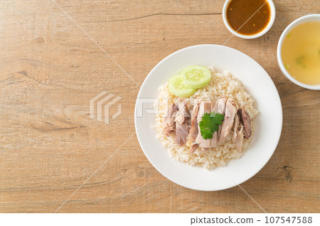 Hainanese Chicken Rice or steamed rice with chicken Hainanese Chicken Rice or steamed rice with chicken 107547588