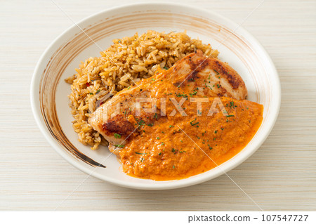grilled chicken steak with red curry sauce and rice grilled chicken steak with red curry sauce and rice 107547727