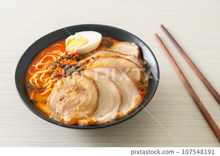 Ramen Noodles Spicy Tomyum Soup with Roast Pork 107548191