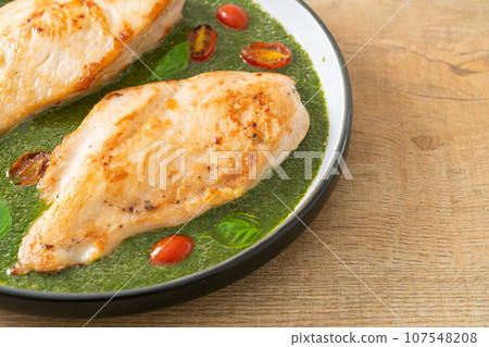 grilled chicken steak with pesto sauce grilled chicken steak with pesto sauce 107548208