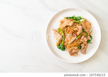 Stir-fried rice vermicelli and water mimosa with pork Stir-fried rice vermicelli and water mimosa with pork 107548215