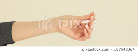 Hand of woman putting fingers together shows asking money Hand of woman putting fingers together shows asking money 107548364