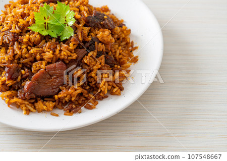 Nasi goreng - fried rice with pork in Indonesia style Nasi goreng - fried rice with pork in Indonesia style 107548667