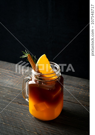 black coffee with orange and lemon juice black coffee with orange and lemon juice 107548717