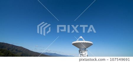 "Nagano Prefecture" Radio telescope parabolic antenna that shines against the clear blue sky 107549691