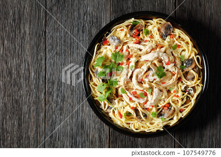 Chicken Pasta Bake with mushrooms, cheese, cream Chicken Pasta Bake with mushrooms, cheese, cream 107549776