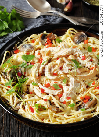 Chicken Pasta Bake with mushrooms, cheese, cream 107549777