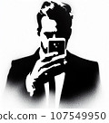 man watching smartphone graffiti stencil-art sprayed in black over white 107549950