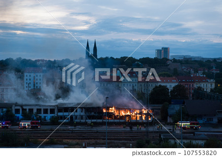 Big fire in a storage building on the territory of the railway station in Prague. 107553820