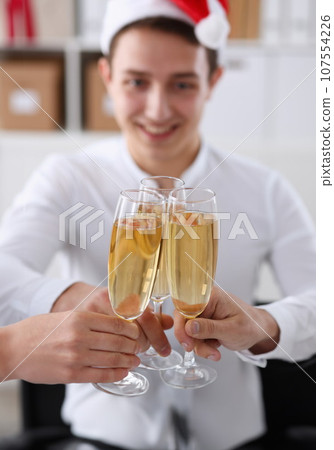 A group of businesspeople celebrating Christmas 107554226