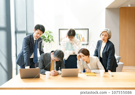 Business person depressed Business person depressed 107555086