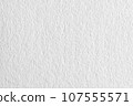 A textured material that is an enlarged photograph of white drawing paper. 107555571