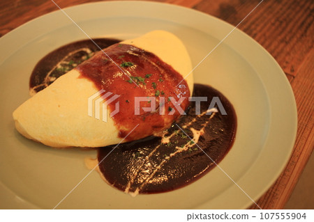 Omelet rice with demiglace sauce Omelet rice with demiglace sauce 107555904