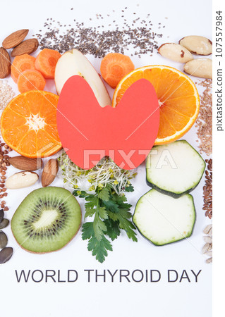 Nutritious ingredients and inscription World Thyroid Day. Healthy food containing vitamins Nutritious ingredients and inscription World Thyroid Day. Healthy food containing vitamins 107557984