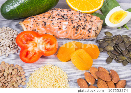 Nutritious food containing natural vitamins and minerals as best eating for healthy hair 107558274