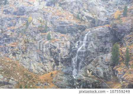 View of river and landscape furi mountain in autumn season from cable car in zermatt, swiss 107559249