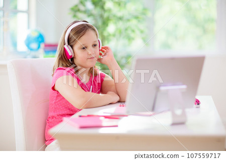 Online remote learning. School kids with computer. Online remote learning. School kids with computer. 107559717
