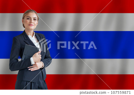 Thai businesswoman on the flag of Thailand digital nomad, business, startup concept Thai businesswoman on the flag of Thailand digital nomad, business, startup concept 107559871