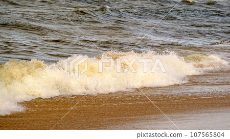 Baltic Sea. Coast. Waves. Beautiful view of the Baltic Sea in autumn. 107565804