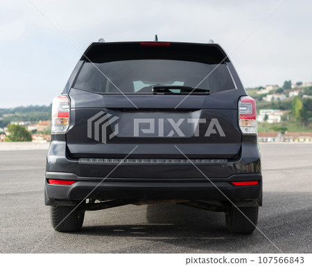 Grey SUV auto, power luxury model. Shiny polished stationary vehicle. 107566843