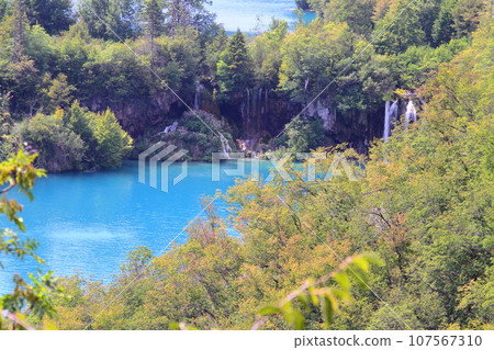 Plitvice Lakes National Park, a world natural heritage site in Croatia, the vivid blue of the lake seen from the Lower Lakes hill Plitvice Lakes National Park, a world natural heritage site in Croatia, the vivid blue of the lake seen from the Lower Lakes hill 107567310