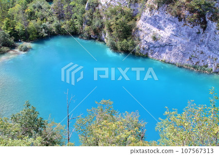 Plitvice Lakes National Park, a world natural heritage site in Croatia, the vivid blue of the lake seen from the Lower Lakes hill 107567313