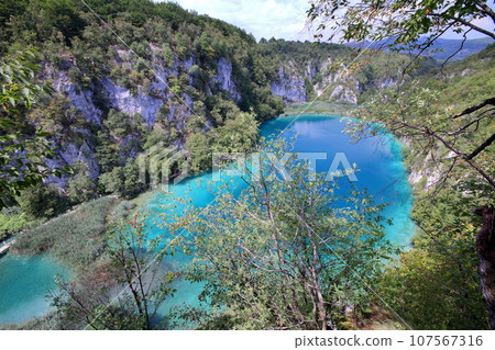Plitvice Lakes National Park, a world natural heritage site in Croatia, the vivid blue of the lake seen from the Lower Lakes hill 107567316