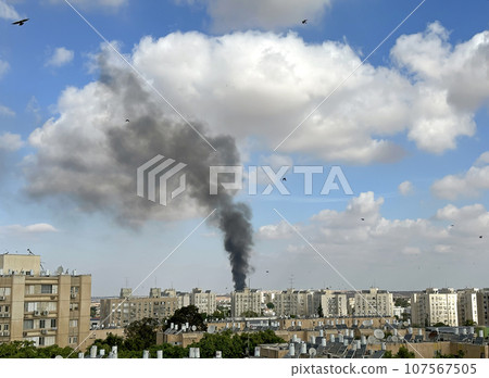 A column of smoke at the site of a fallen Hamas rocket A column of smoke at the site of a fallen Hamas rocket 107567505