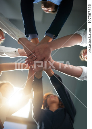 Hands together, solidarity and business people in team with low angle, support and trust with professional community. Diversity, collaboration and corporate group in meeting with goals and commitment Hands together, solidarity and business people in team with low angle, support and trust with professional community. Diversity, collaboration and corporate group in meeting with goals and commitment 107567866
