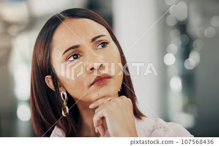 Thinking, office and face of business woman for ideas, brainstorming and problem solving. Professional, corporate and worker in workplace with thoughtful, wonder and solution for planning project 107568436