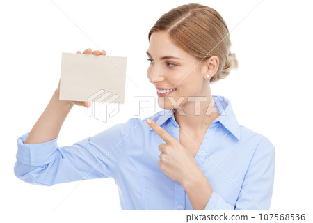 Presentation, card and pointing business woman marketing a brand on a white background in studio. Happy, branding and employee showing a sales paper for advertising of logo on a studio background 107568536