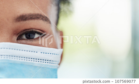 Eye focus, covid mask zoom and mockup of a black woman outdoor with blurred background. Eyes closeup, portrait and health care for optometry and eyesight check with young African female with mock up 107569077