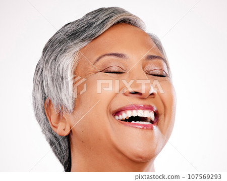 Beauty, face and mature woman laugh at funny skincare joke, cosmetics humour or natural facial makeup. Spa salon comedy, eyes closed and studio person smile for dermatology glow on white background 107569293