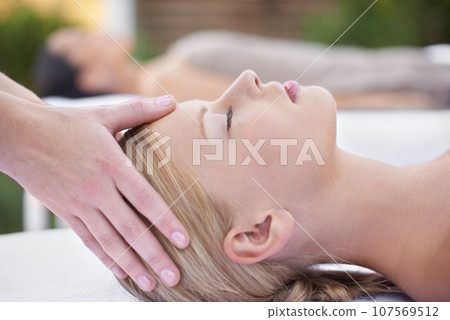 Relax, facial massage, women at reiki spa for health, wellness and luxury treatment with eyes closed. Beauty salon, professional skin care therapist and healthy face of woman with cosmetic therapy. Relax, facial massage, women at reiki spa for health, wellness and luxury treatment with eyes closed. Beauty salon, professional skin care therapist and healthy face of woman with cosmetic therapy. 107569512