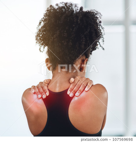 Rear view, young black woman and suffering from back pain or wearing sports bra or shoulder health and on white background. Afro, girl person and feeling hurt from gym or joint ache and fibromyalgia Rear view, young black woman and suffering from back pain or wearing sports bra or shoulder health and on white background. Afro, girl person and feeling hurt from gym or joint ache and fibromyalgia 107569698