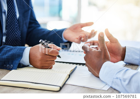 Plans are of little importance, but planning is essential. Shot of a unrecognizable businessman signing a contract in a office. 107569781