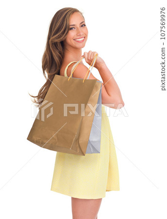 Fashion portrait, shopping bags and woman in studio isolated on a white background. Black Friday, sales deals and happy, rich and wealthy female customer standing with gifts after buying at mall. Fashion portrait, shopping bags and woman in studio isolated on a white background. Black Friday, sales deals and happy, rich and wealthy female customer standing with gifts after buying at mall. 107569976